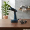 Midnight blue handheld garment steamer