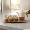8 piece coffee set with wooden tray on kitchen table