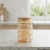 Empty rippled glass tumbler on counter