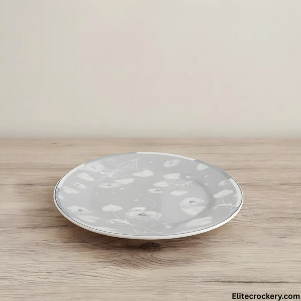 Elegant Bone Dinner Plate Angled Angled view of floral dinner plate from Elegant 61 piece set