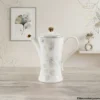 Elegant Porcelain Teapot Gold Knob Tall porcelain teapot with gold knob from Elegant bone dinner 61 piece set