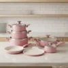 Complete SK kitchen set 16 piece display in pink on marble