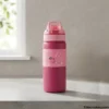 Dark pink sipper bottle with strawberry graphic