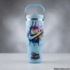 Light blue kids tumbler with colorful Nike graphic
