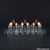 Glass Jar Set with Tray featuring rose gold lids on dark background