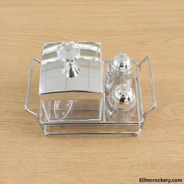Top-down view of Crystal Salt and Pepper Shaker Set on wooden background