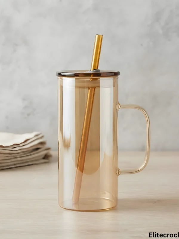 Side view of amber glass mug with straw