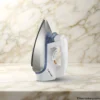 Side profile of Westpoint Dry Iron showcasing non-stick soleplate