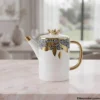 Crown-lidded porcelain teapot from the 8 piece coffee set