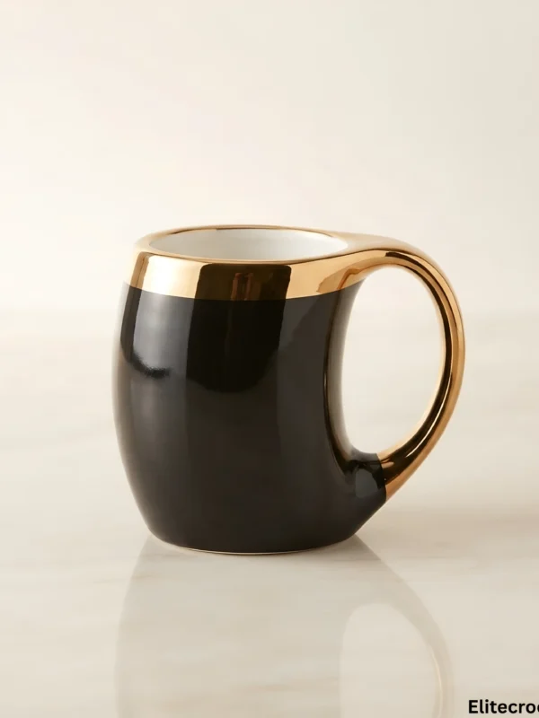 Luxury black ceramic mug with ergonomic gold handle and gold rim