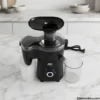 Anex Juicer Blender operating on a modern marble kitchen counter