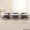 Midnight Tropical Leaf Tea Cup Set displayed on wooden surface