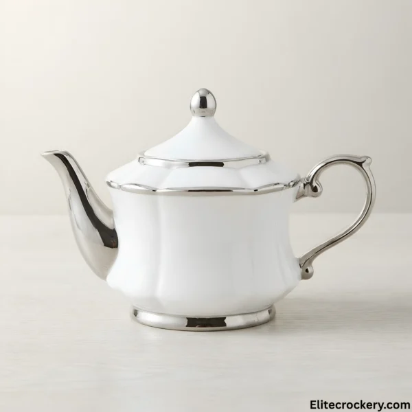 White teapot side view with silver accents