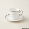 White tea cup and saucer with silver trim