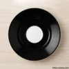 Top view of black and white ceramic saucer