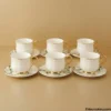 Set of Six Tea Cups Set of six white and gold tea cups and saucers