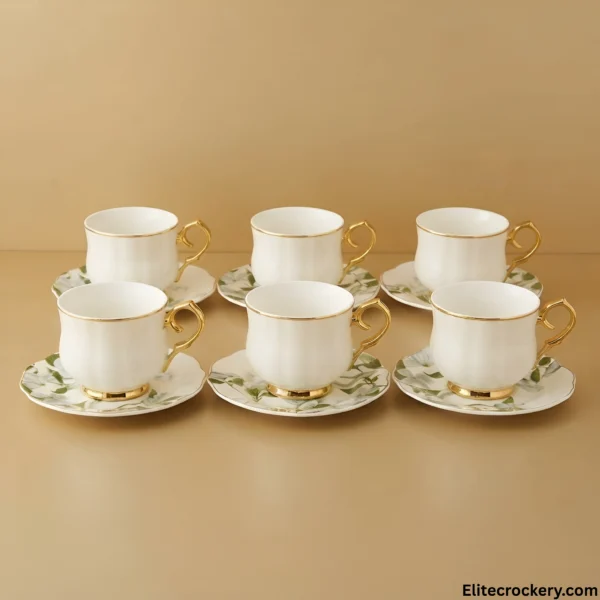 Set of Six Tea Cups Set of six white and gold tea cups and saucers