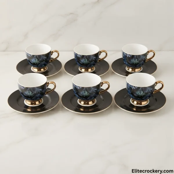 Arrangement of six luxury tea cups and saucers on marble